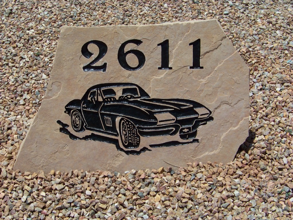 closeup shot of 2611 car model sticker on a tile